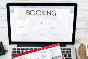 What is Booking Holdings up to with its big 2021 spending spree?