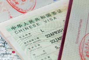 Visa searches jump as China adds new passports to roadmap for Covid exit on Jan. 8