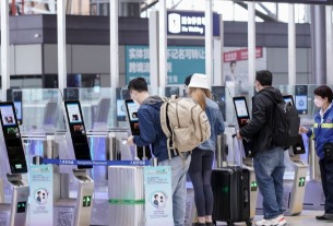 Arrivals to Hong Kong triple in a month to 1.4 million